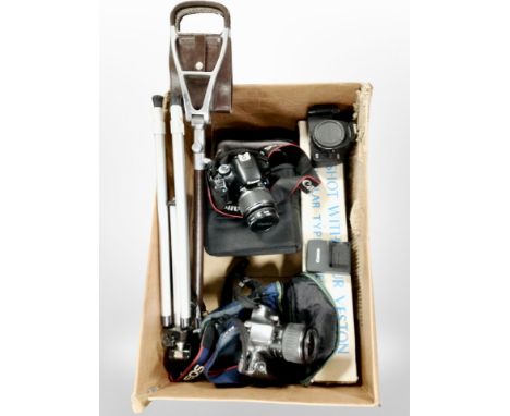 A box of cameras including Canon EOS450D, CANON EOS3000V, etc., together with a camera tripod, camera bags, a shooting stick.