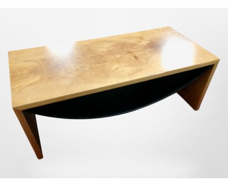 A Scandinavian walnut effect rectangular coffee table with curved under shelf 