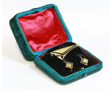 A Continental, cased, Victorian, two colour gold brooch and earring split pearl suite,an elongated triangular form brooch wit