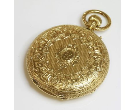 An 18ct gold top wind hunter pocket watch,42mm diameter, with an engine turned and engraved case.  An oval cartouche to the f