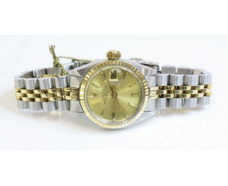 A ladies' bicolour Rolex 6917 Oyster Perpetual watch, c.1978, a champagne dial with raised gilt batons and hands, date and ac