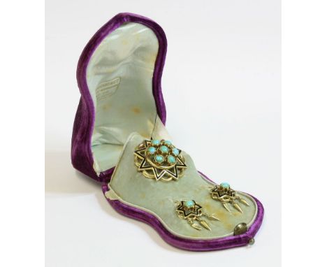 A cased French gold and turquoise brooch and earring suite, c.1870,the brooch of open star form, with a cluster of cabochon t