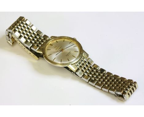 A gentlemen's gold-plated Omega Automatic Seamaster de Ville bracelet watch, c.1960,a circular silvered dial, raised batons, 