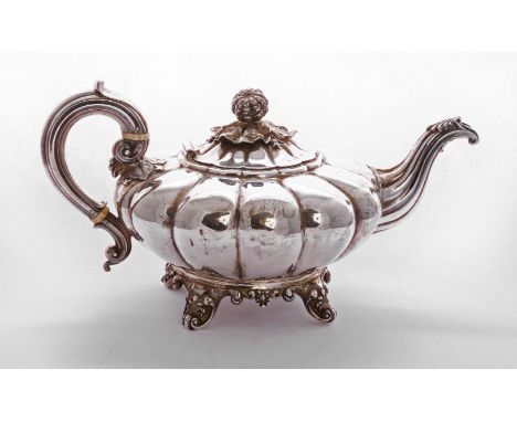 A William IV silver teapot, by Messrs. Barnard, London 1834, of lobed circular form, with naturalistic gourd finial to cover,