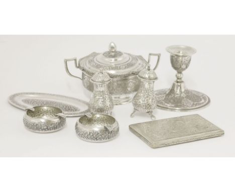 A collection of Persian metalwares,comprising:a candlestick, a two-handled bowl and cover, a pair of silver ashtrays, a cigar