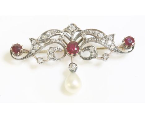 A late Victorian, ruby, diamond and pearl brooch/pendant, c.1890, a scrolling foliate bar, grain set with graduated old Swiss
