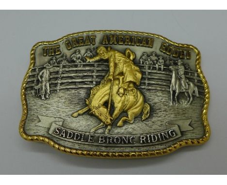 A solid sterling silver, layered with 24kt gold buckle, The Great American Rodeo, 155g