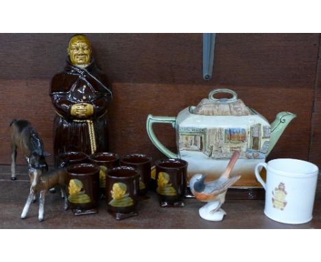 A monk liqueur set, a Shelley 1911 Coronation cup, a Royal Doulton Dickens Ware Bill Sykes teapot, crazed, two Beswick foals,