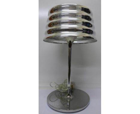 A chrome table lamp