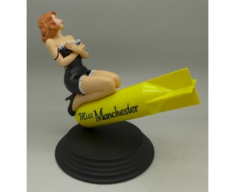 A Flight Plan Collectibles limited edition model of Miss Manchester kneeling on a bomb, boxed