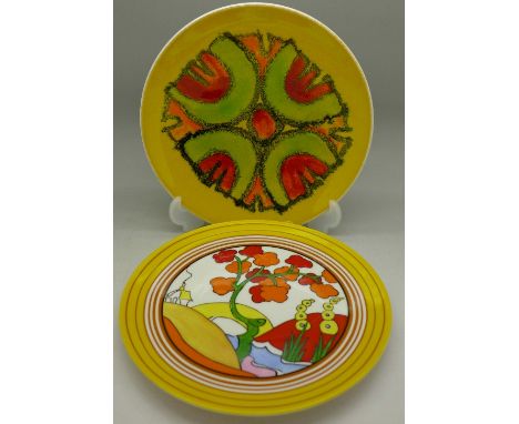 A Poole Pottery plate and a Wedgwood Bradex Clarice Cliff plate, (2)
