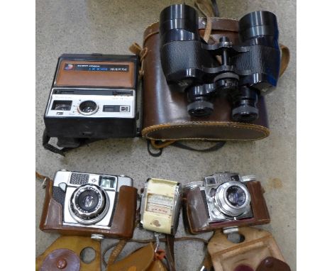 An Agfa Optima camera, a Braun Super Paxette, a Kodak EK100 instant camera and a pair of Ross 7 x 42 binoculars, (4)