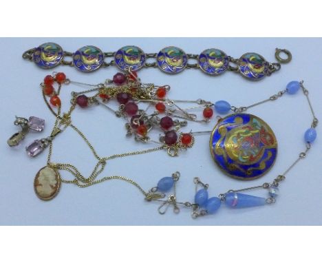 An enamel bracelet and a matching brooch, necklets and a pair of earrings