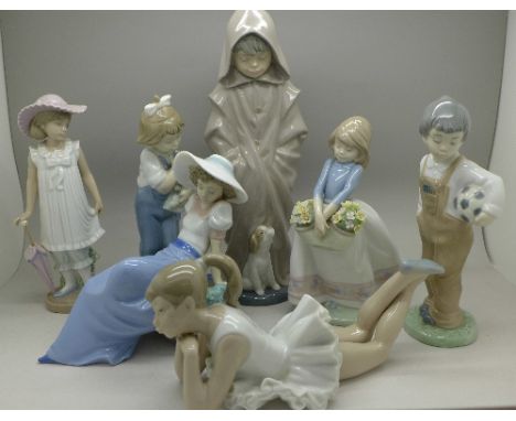 A Lladro figure, boxed and six Nao figures (7)