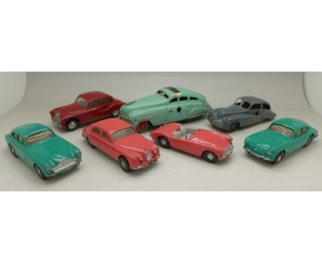 A Schuco FEX1111 clockwork tin-plate motor car, five Spot-On motor cars and a Brimtoy Pocketoy clockwork car, (7)