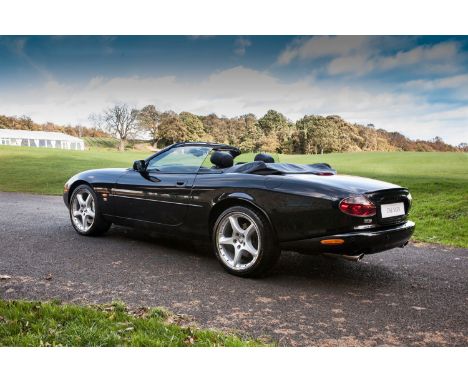 We are delighted to offer to auction this 2003 Jaguar XK-R Convertible finished in Ebony black metallic with matching black l