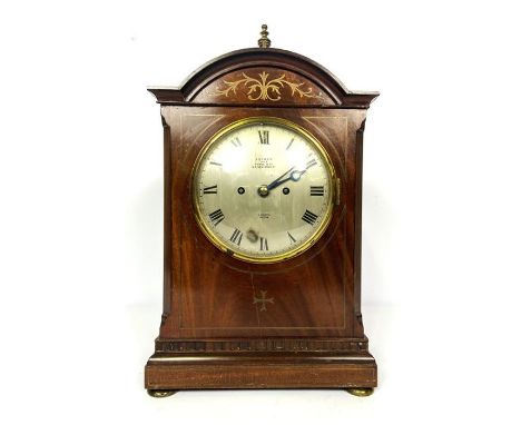 An Asprey George III style bracket clock, circa 1900, in an Architectural case, with arched top, silvered dial, signed Asprey