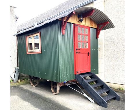 A traditional Shepherd’s Hut, 19th century and later, (Glenfield & Kennedy of Kilmarnock rolling stock), of typical form with