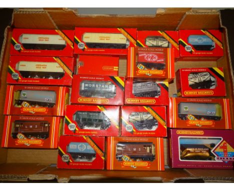 A large group of HORNBY Railways OO Scale vans and wagons as lotted - VG in F/G boxes  (18)