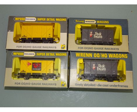 A group of rarer issue ventilated vans by WRENN Railways to include: W5004X, W5004 'Dunlop' and 2 x W4318P/A 'Peak Freans - G