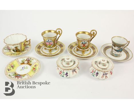Pair of 19th century ink pots and covers, painted with floral spray together with Sevres-style cups and saucers, a yellow cup