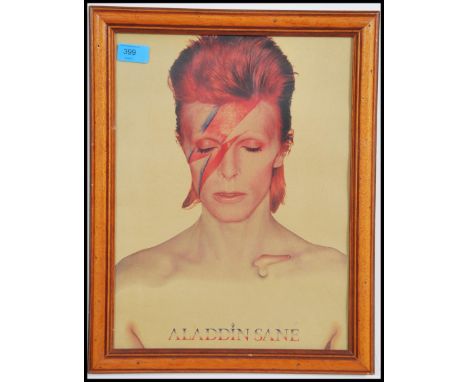 A vintage David Bowie 'Aladdin Sane' framed and glazed print, depicting Bowie in his infamous Ziggy Stardust persona. 