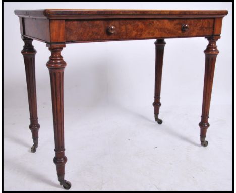 A Victorian mahogany Holland & Sons of London writint table desk. Raised on turned, tapering legs with ceramic castors. Fitte