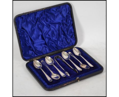 A silver hallmarked teaspoon and sugar nips set complete in the original presentation case by  Harrison Brothers & Howson, Sh