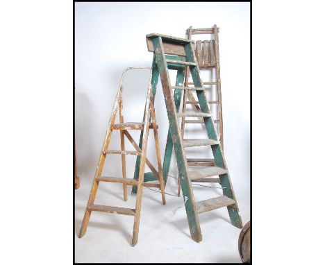 A group of three vintage 20th century wooden step ladders to include a painted example please see images. Measures: 166cms hi
