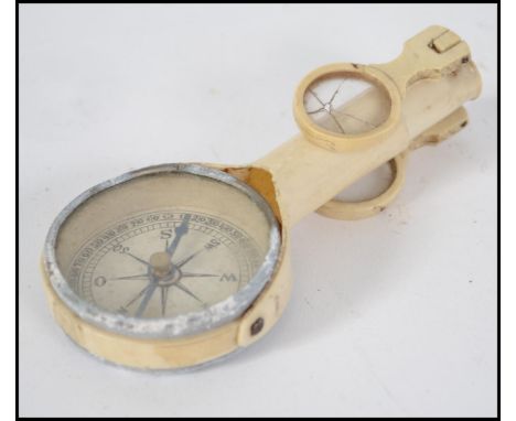 A set of vintage imitation folding ivory opera glasses / compass ( A/F ) dating from the 1880's. Measures 8cm long.