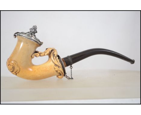 A good early 20th century gentlemans meerschaum smoking / smokers pipe of shaped form having decorative bowl with rococo silv