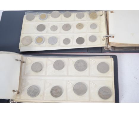 A good coin collection held within two albums to include various pre and post decimal coins, Victorian coins, American casino