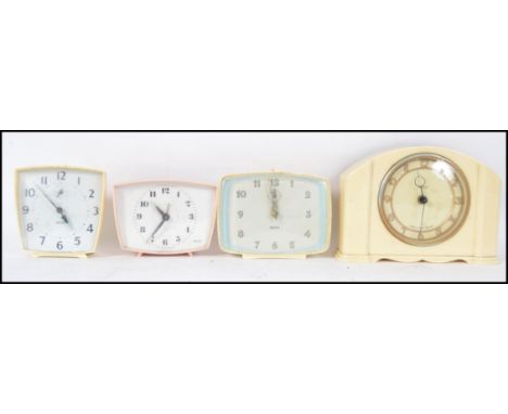 A group of 4 retro 20th century vintage Smiths clock to include a bakelite mantle clock and three other smaller Smiths clocks