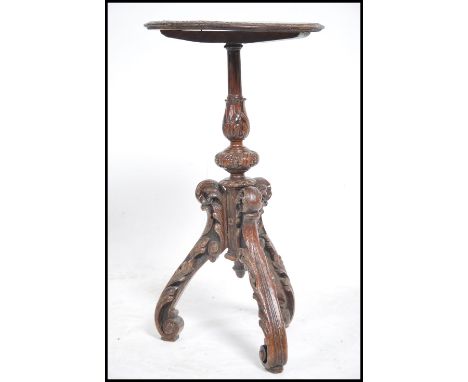 A late 19th century / early 20th century tripod wine table. Measures:  73xms high x 40cms diameter. 