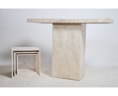 A large contemporary marble console table having pedestal base with veined white marble top and body together with a nest of 