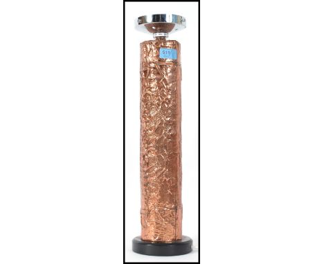 Hand made cylindrical copper lamp with interesting tactile repousse relief decoration of organic and geometric form.  This 20