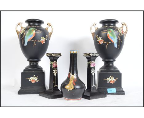 A pair of decorative Shelley china ceramic candlesticks together with 2 similar large twin handled vases raised on plinth bas