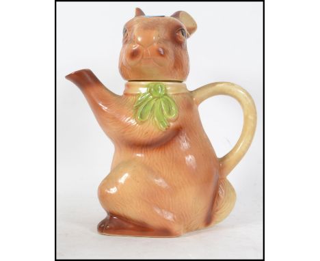 An unusual retro Tony Wood Staffordshire England ceramic teapot in the form of a rabbit being stamped to the base