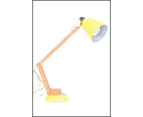 A retro 20th century Terence Conran ' Mac ' Lamp - anglepoise desk lamp circa 1950's - mid century having yellow shade with w