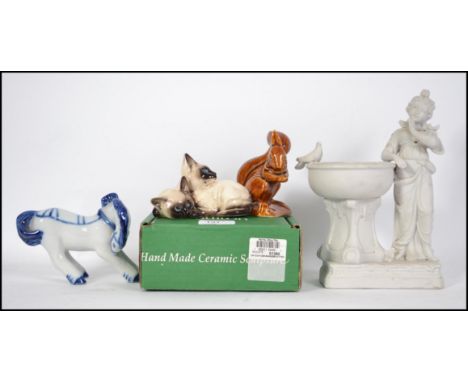 A Royal Doulton figurine of Siamese cats model no 1296 complete in the box together with a USSR blue and white horse and a Po