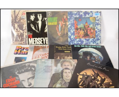 A collection of vinyl long play LP records to include The Rolling Stones x 2, Wings, Crosby Stills and Nash, Small Faces, Pro