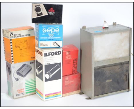 A collection of vintage and retro photographic developing equipment to include a kodak light box, Cm 50 color meter, Gepe 135