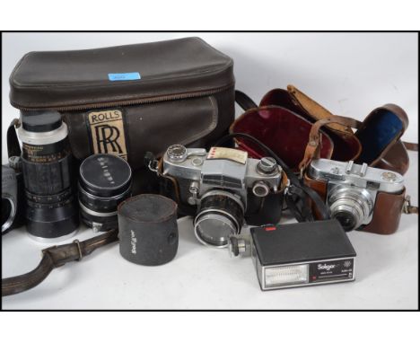 A collection of vintage 20th century 35mm camera and lenses to include Miranda, Voightlander,  Practika etc.