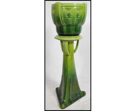 A rare late 19th century Bretby ceramic glazed planter on stand - Jardiniere torchere in the secessionist manner being stampe