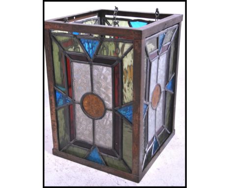 A fabulous arts & crafts stained and leaded glass lantern lamp shade - ceiling lamp having multi coloured stained glass panel