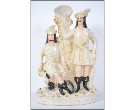A 19th century Staffordshire flat back figurine spill vase of plain form with seated gentleman next to tree trunk ( unmarked 
