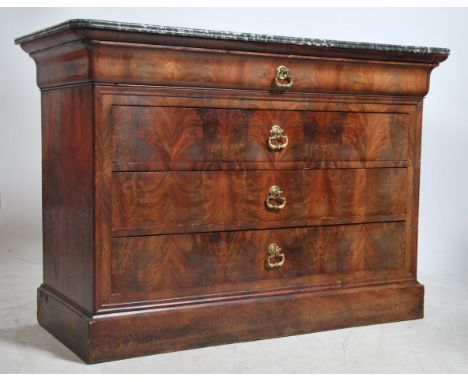 A 19th century French marble top walnut large commode chest of drawers. Raised on a plinth base having a mottled grey, black 