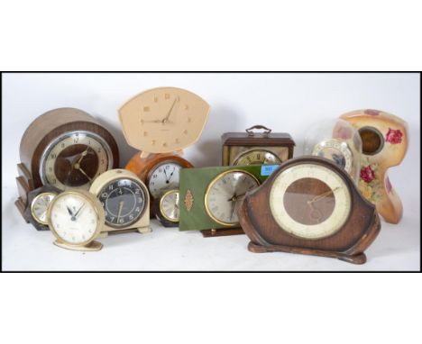 A collection of vintage mid century clocks to include mantel clocks, Staffordshire ceramic clocks, marble, retro, glass dome 