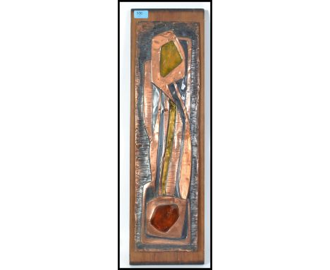 An enamel and copper metal work plaque of abstract form by Danish artist Ernst Grundtvig 1920-1994.  This Art Deco piece has 