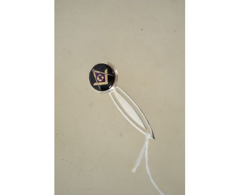 A silver and enamel bookmark with masonic symbol. Measures 5cm long.